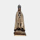 Monumental Classical Our Lady of Fatima Bronze Statue by Giant Sculptures, 400cm figure in prayer with rosary and crown, shown on a plain grey background.