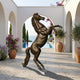 Giant Sculptures Monumental Classical Rearing Horse Bronze Sculpture 320cm rearing on a Mediterranean tiled courtyard with arches, potted olive trees, and pool view.