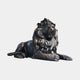 Monumental Classical Recumbent Lion Bronze Sculpture by Giant Sculptures in dark antique patina with silver-grey highlighted mane, on a plain light background.