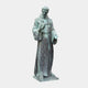 Monumental Classical Robed Saint Bronze Statue by Giant Sculptures, 300cm figure in Franciscan habit with verdigris patina on a stone plinth, plain background.