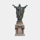 Giant Sculptures Monumental Classical Sacred Heart Jesus Bronze Statue 300cm with arms outstretched, grey-green patina, on inscribed granite pedestal, plain background.