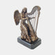 Monumental Classical Seated Angel Harp Bronze Sculpture by Giant Sculptures, shown with dark brown patina, feathered wings and ornate harp, on a black base.