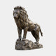 Monumental Classical Standing Lion Bronze Sculpture by Giant Sculptures, 200cm, shown in side profile on a rocky base with warm antique bronze patina.