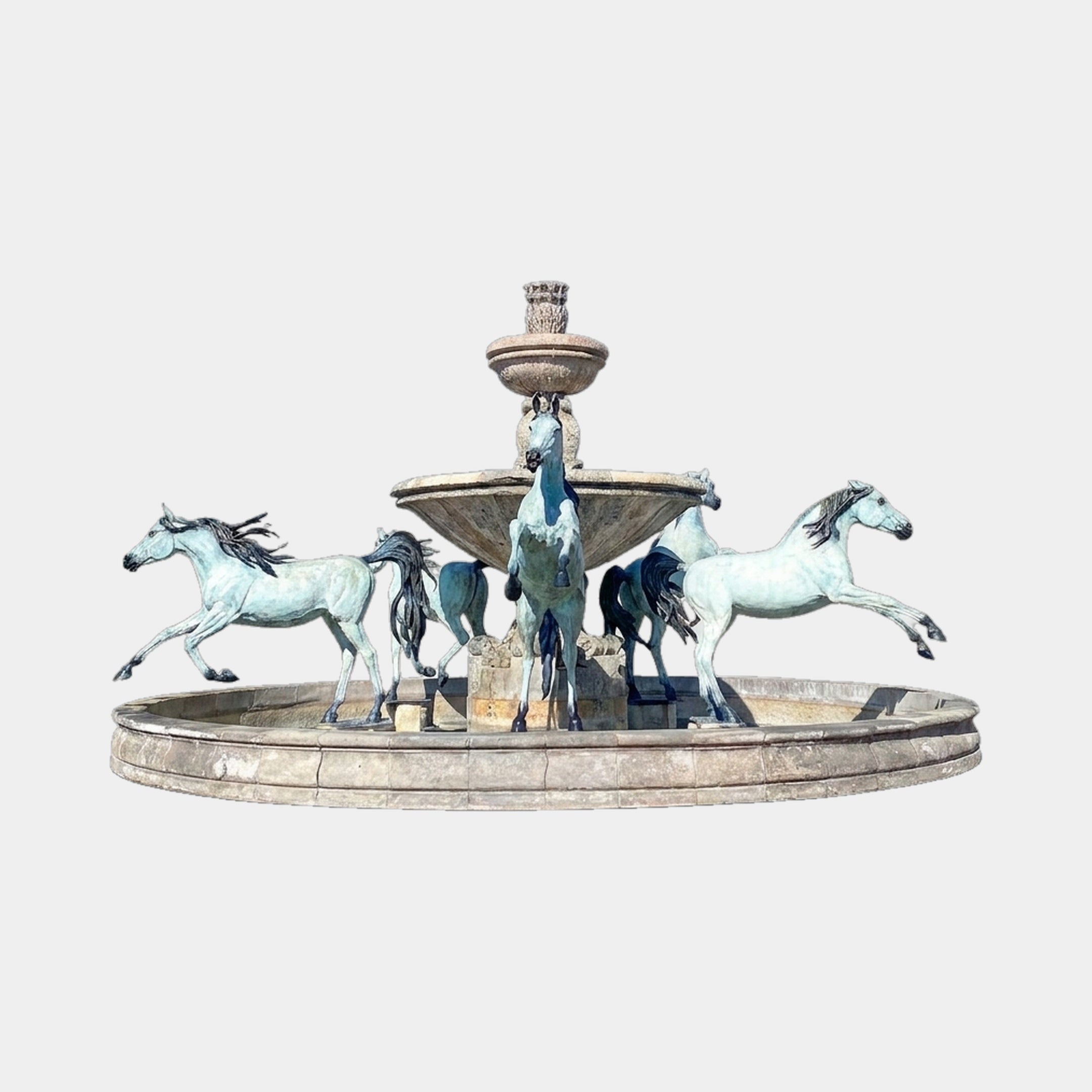 Monumental Classical Three Horses Bronze Fountain by Giant Sculptures, 550cm, with verdigris horses mid-stride around a tiered stone basin on a plain background.