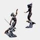 Monumental Classical Triton and Mermaid Bronze Sculpture by Giant Sculptures, bearded Triton with trident and mermaid on wave bases, antique patina, white background.