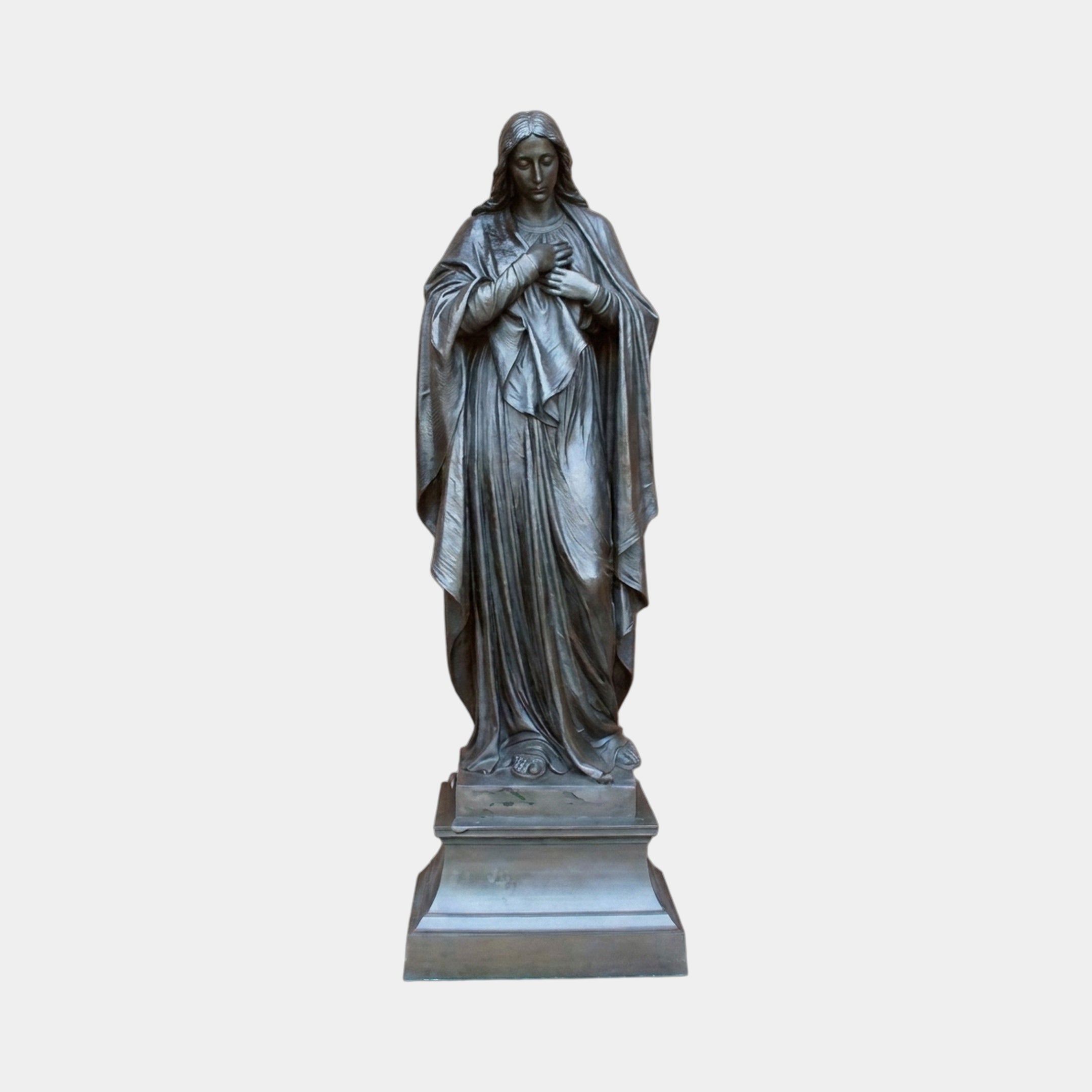 Monumental Classical Virgin Mary Bronze Statue by Giant Sculptures, 300cm draped figure with hands crossed over heart on a stepped plinth, grey background.