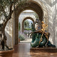 Monumental Classical Warrior on Rearing Horse and Dragon Bronze Sculpture by Giant Sculptures displayed on a wooden plinth in an archway courtyard.