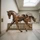 Giant Sculptures' 290cm Monumental Contemporary Abstract Trotting Horse Bronze Sculpture in warm brown patina, displayed mid-stride in a skylit museum gallery.