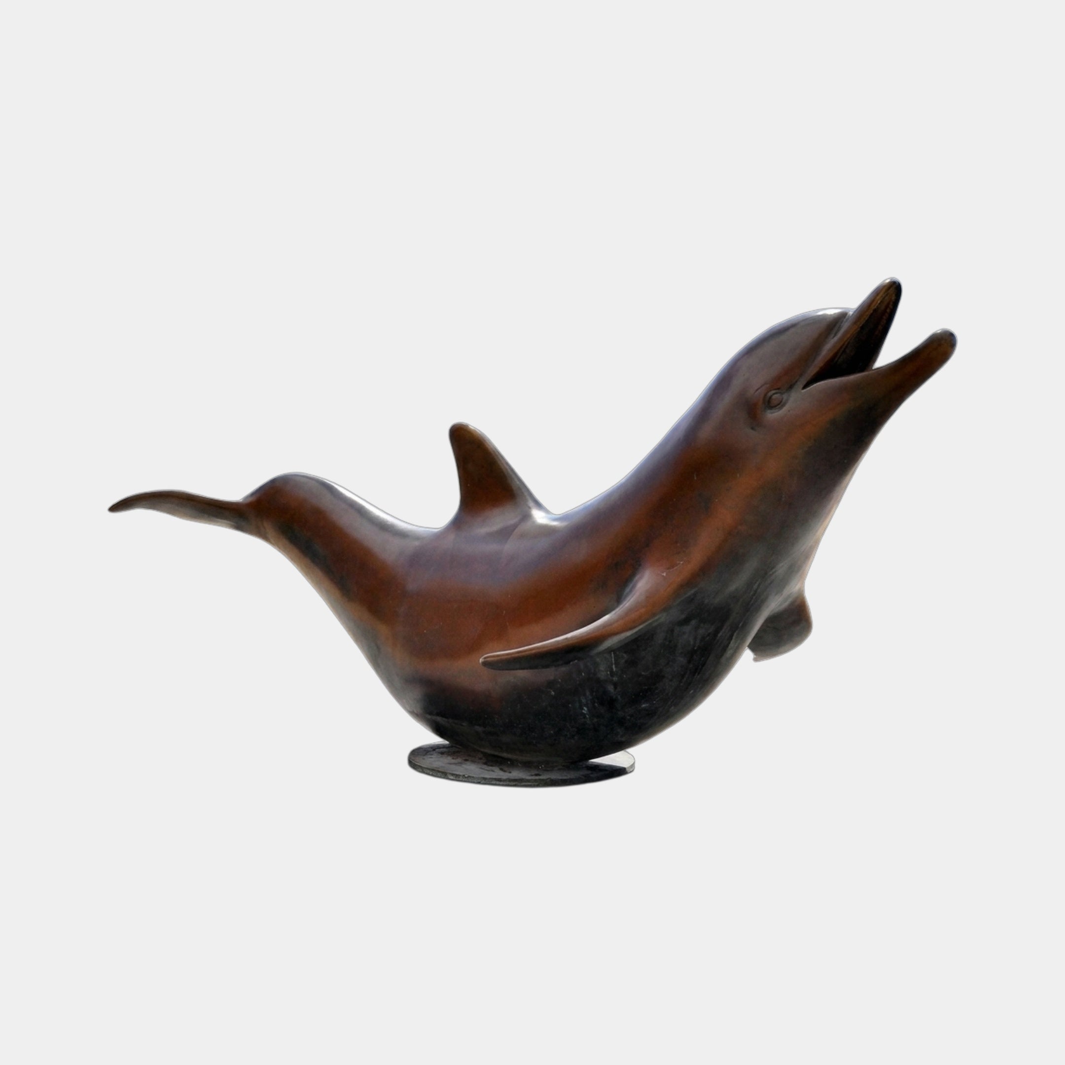 Monumental Contemporary Arched Dolphin Bronze Sculpture by Giant Sculptures, shown in profile with head raised and tail curled, warm brown and near-black patina.