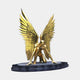 Monumental Contemporary Crouching Angel Bronze Sculpture in polished gold by Giant Sculptures, kneeling figure with vast upswept wings on a dark oval plinth.