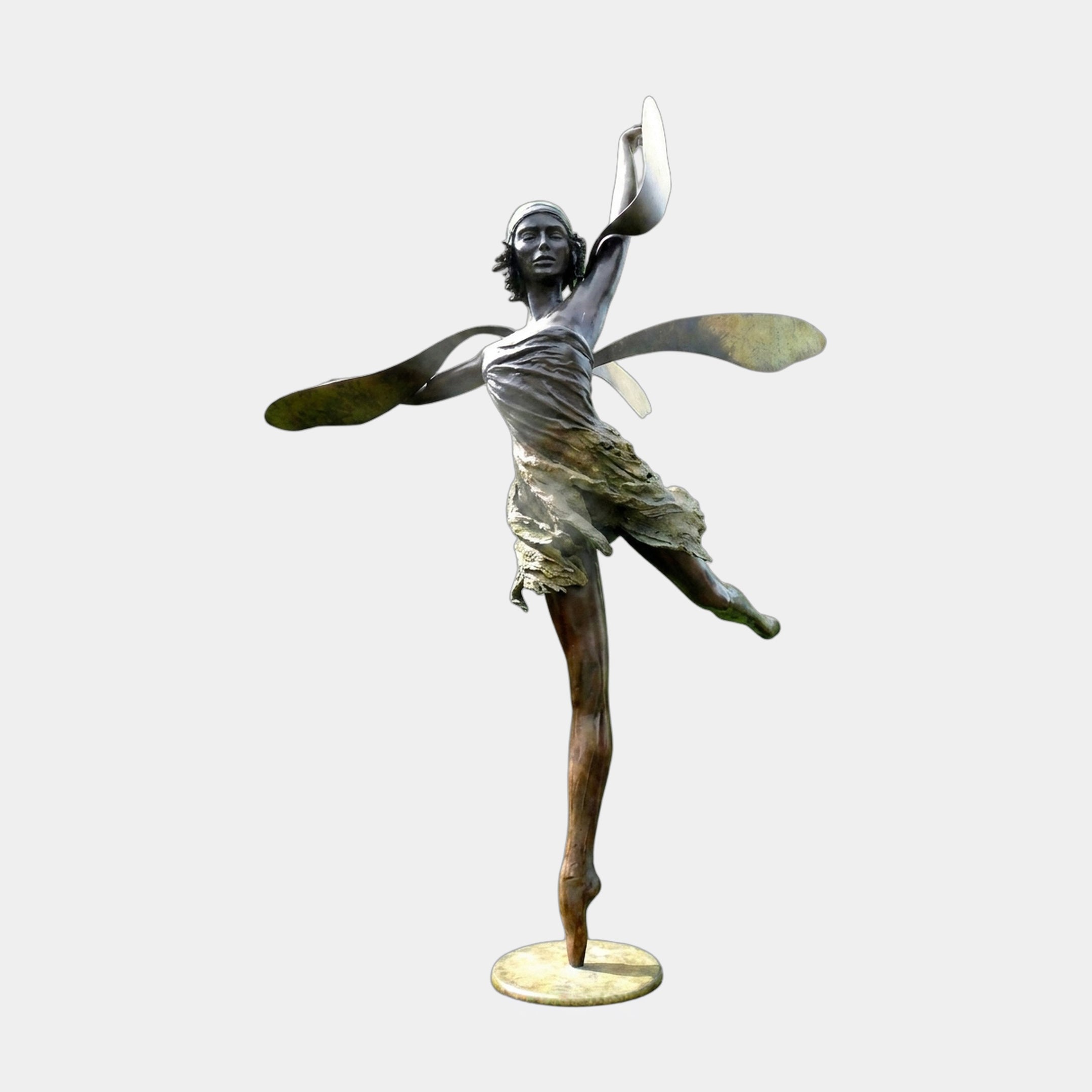 Monumental Contemporary Dancing Fairy Bronze Sculpture by Giant Sculptures, female figure en pointe with dragonfly wings and raised ribbon, two-tone patina.