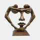 Giant Sculptures Monumental Contemporary Dual Figures Face Bronze Sculpture with two arched nude figures forming a stylised face, on a plain background.