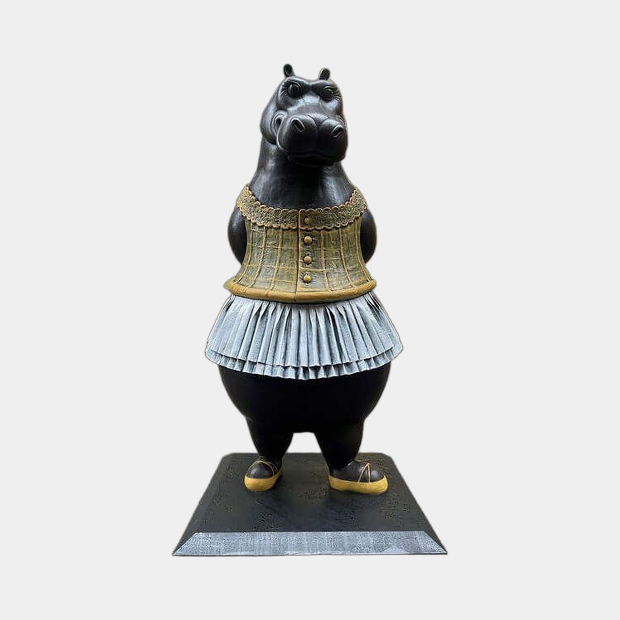 Monumental Contemporary Hippopotamus Ballerina Bronze Sculpture by Giant Sculptures, front view with black patina, gold corset, grey pleated tutu on plain background.