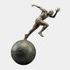 Giant Sculptures Monumental Contemporary Male Runner Bronze Sculpture 330cm, lean athletic figure sprinting atop a large dark bronze sphere, plain background.