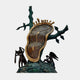Giant Sculptures Monumental Contemporary Melting Clock and Figures Bronze Sculpture with golden warped clock on a dark tree, nude and winged figures at base.