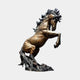 Giant Sculptures Monumental Contemporary Rearing Horse Bronze Sculpture in golden-brown patina with darker mane, tail and rocky base, shown against a plain grey background.