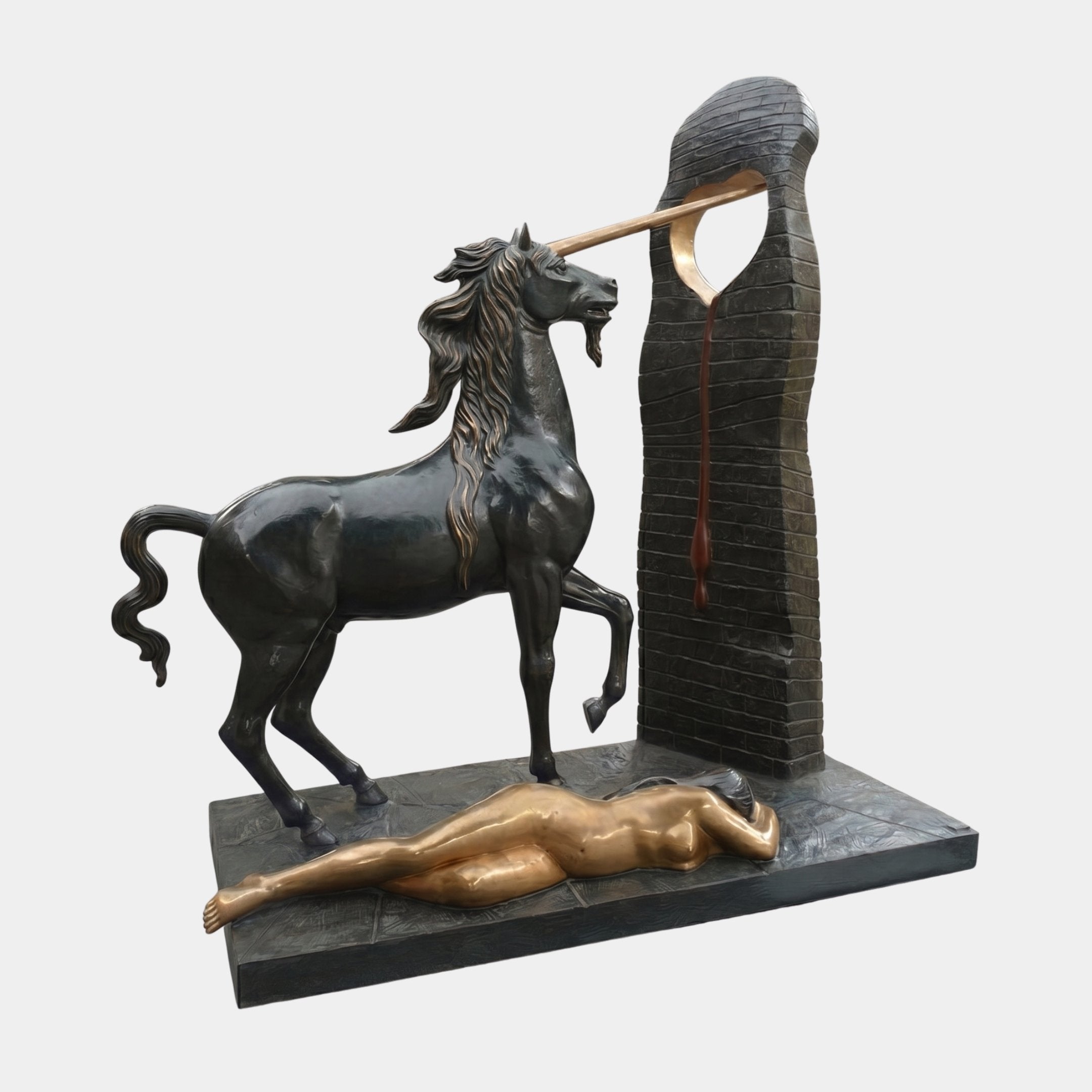 Monumental Contemporary Rearing Unicorn Bronze Sculpture by Giant Sculptures, with dark patinated horse, gold horn piercing a brick tower, and prone gilded figure.