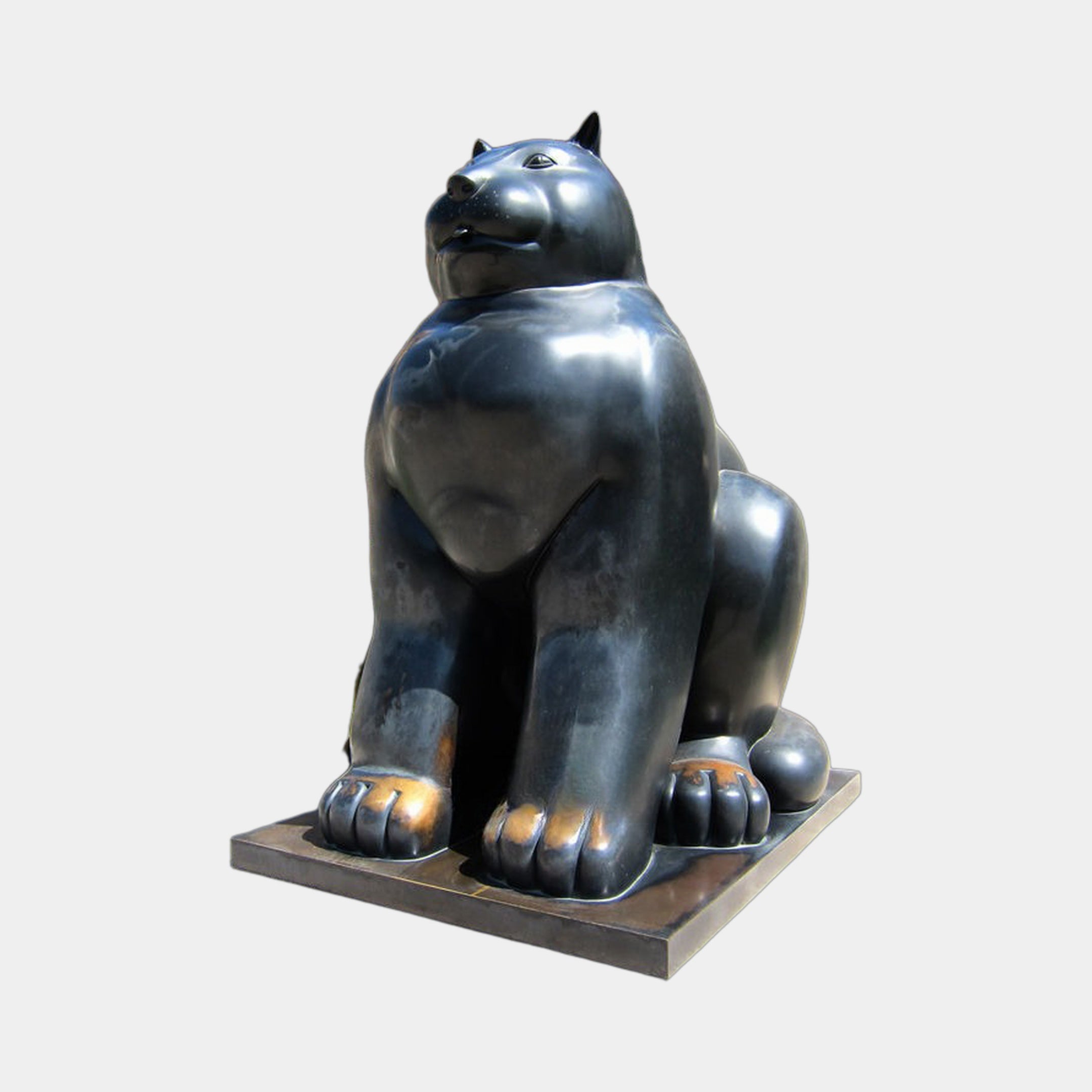 Monumental Contemporary Rotund Seated Cat Bronze Sculpture by Giant Sculptures in glossy black with golden-brown wear on the paws, shown front-angled on a plain background.