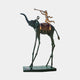Monumental Surrealist Elephant and Trumpeting Rider Bronze Sculpture by Giant Sculptures, verdigris elephant on elongated legs with gilded trumpeter rider.