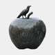 Monumental Crow on Apple Bronze Sculpture by Giant Sculptures, 350cm, showing a black crow perched on the stem of a verdigris-patinated apple form.