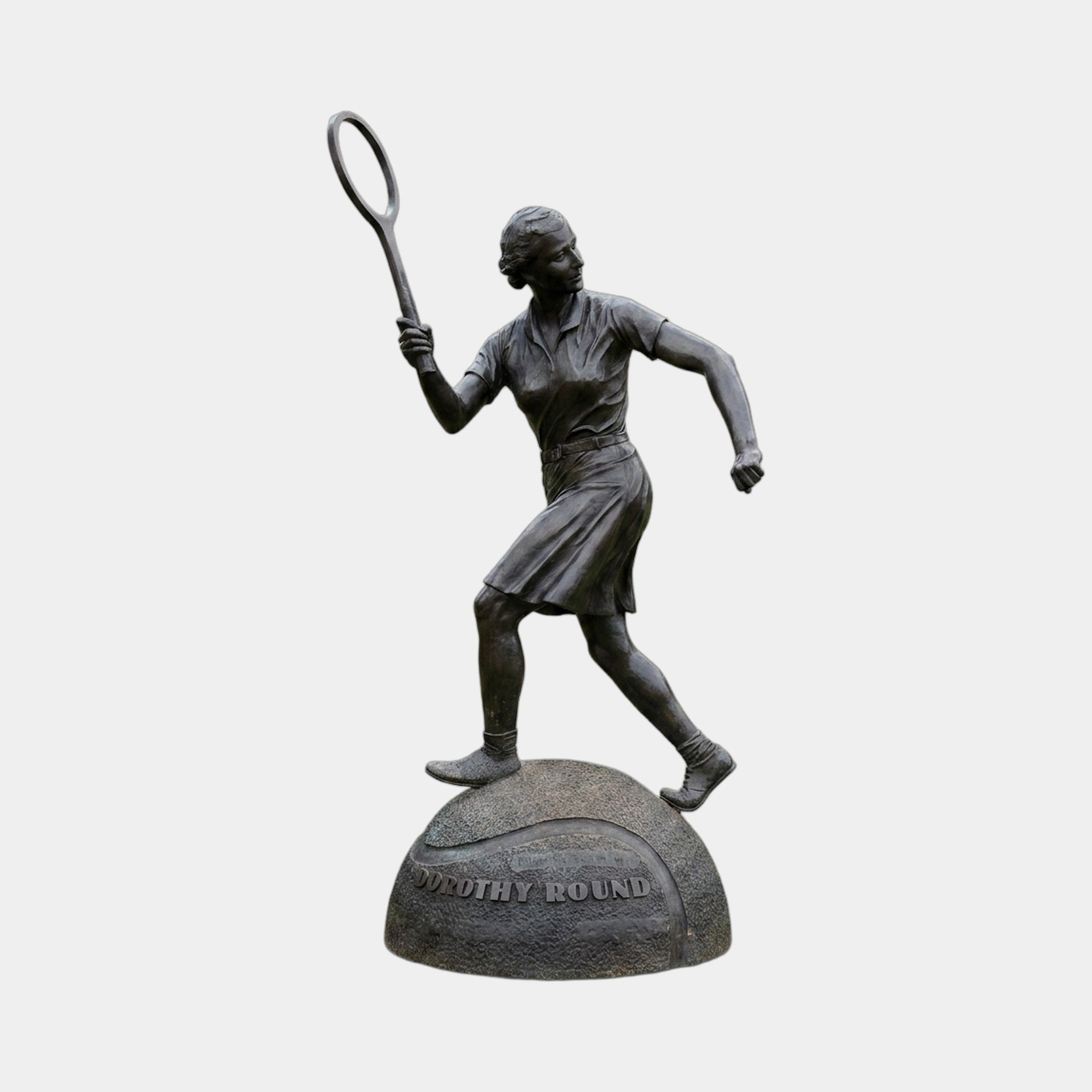 Monumental Female Tennis Player Bronze Sculpture by Giant Sculptures, 220cm, mid-swing pose with raised racket on a domed granite plinth inscribed Dorothy Round.