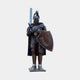 Monumental Heraldic Armoured Knight Bronze Sculpture by Giant Sculptures, 320cm, with raised sword, plumed helm, and U-emblem shield on a plain background.