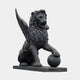 Monumental Heraldic Winged Lion Bronze Sculpture by Giant Sculptures, seated with wings raised and one paw on a sphere, dark patina finish on a rectangular base.