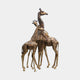 Monumental Life-Size Giraffe Herd Bronze Sculpture by Giant Sculptures, three clustered giraffes in golden-amber with dark spots, shown on a plain background.