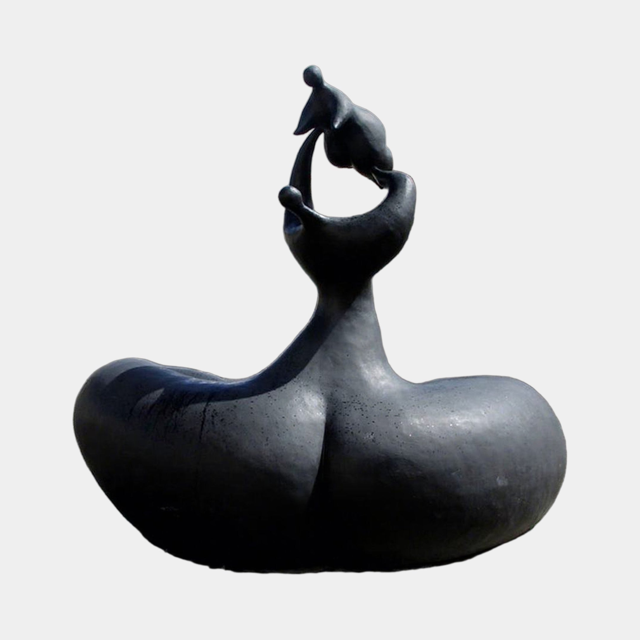 Monumental Modern Abstract Mother and Infant Bronze Sculpture by Giant Sculptures, near-black patina with two intertwined figures rising from a rounded base.