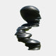 Monumental Modern Spiralling Head Bronze Sculpture by Giant Sculptures in matte black, shown in profile with a stylised face above a helical twisting form.
