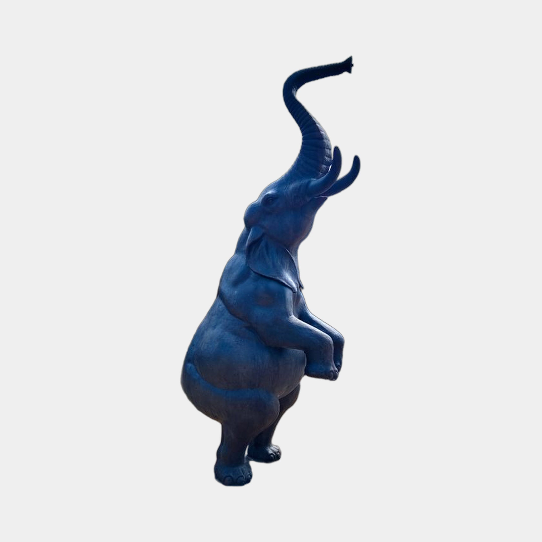 Monumental Rearing Elephant Bronze Sculpture by Giant Sculptures, 360cm dark-patinated bronze figure rearing on hind legs with trunk curled skyward, side view.