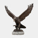Monumental Spread-Wing Eagle Bronze Sculpture by Giant Sculptures, 350cm, dark antique patina, wings raised in full extension, perched on a rocky stone base.