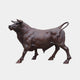 Monumental Traditional Charging Bull Bronze Sculpture, 220cm, side view with lowered head and curled tail, on a plain white background.