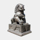 Monumental Traditional Chinese Guardian Lion Bronze Sculpture by Giant Sculptures, 250cm, seated with paw on sphere atop a relief-carved plinth, plain background.