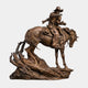 Giant Sculptures' Monumental Traditional Cowboy and Child on Rearing Horse Bronze Sculpture in warm patina, cowboy pointing ahead with child, on rocky base.