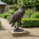 Giant Sculptures Monumental Traditional Eagle Bronze Sculpture perched on a stone plinth in a formal garden with lavender borders and gravel path.