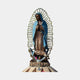 Monumental Our Lady of Guadalupe bronze statue by Giant Sculptures, 450cm, polychrome blue mantle and brown robe with gold mandorla halo on tiered plinth.