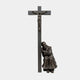 Monumental Traditional Praying Saint and Crucifix Bronze Sculpture by Giant Sculptures, 350cm, dark patina, saint seated at foot of cross with Christ above.