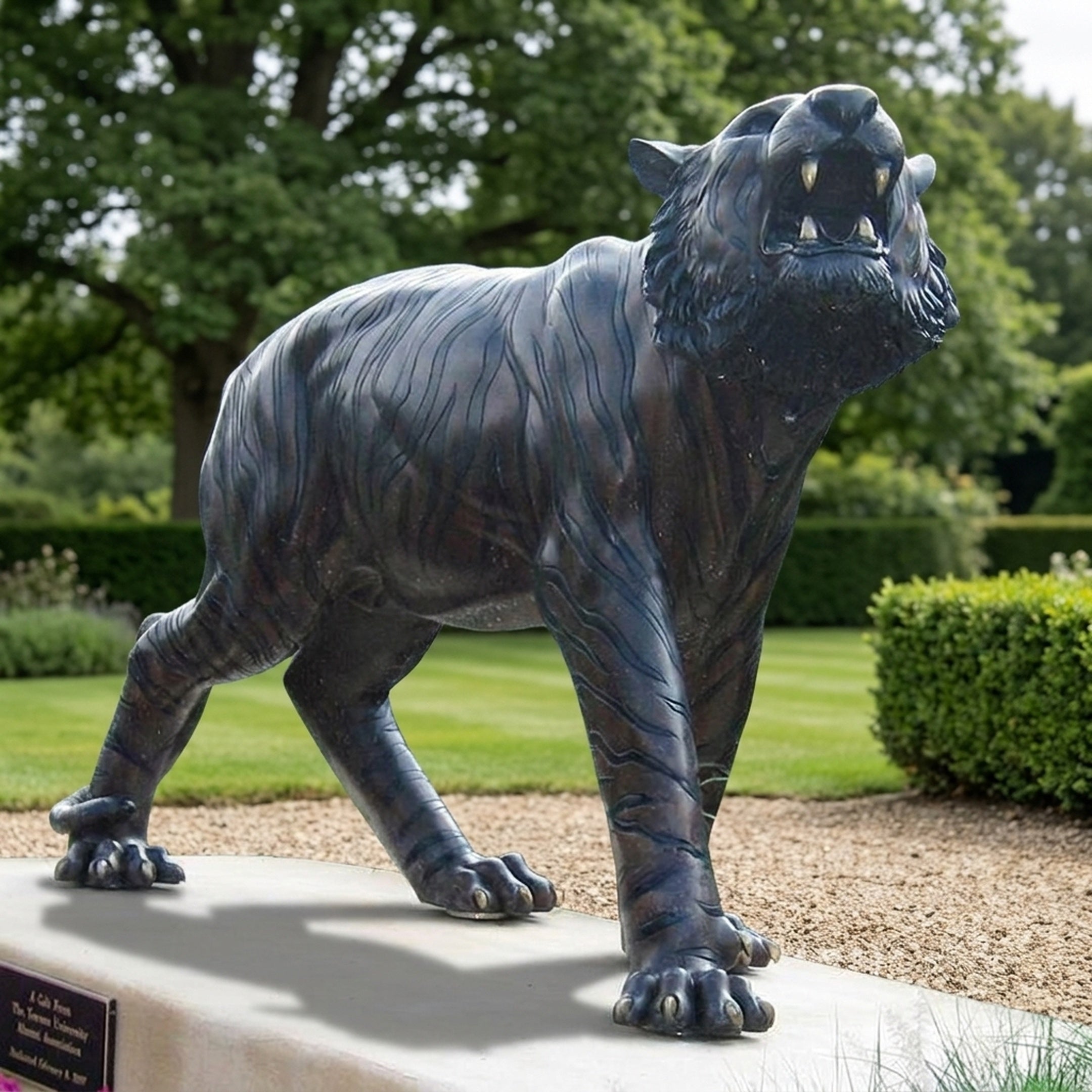 Monumental Traditional Roaring Tiger Bronze Sculpture by Giant Sculptures, 180cm, dark patina, mid-roar pose on a stone plinth in a landscaped garden.