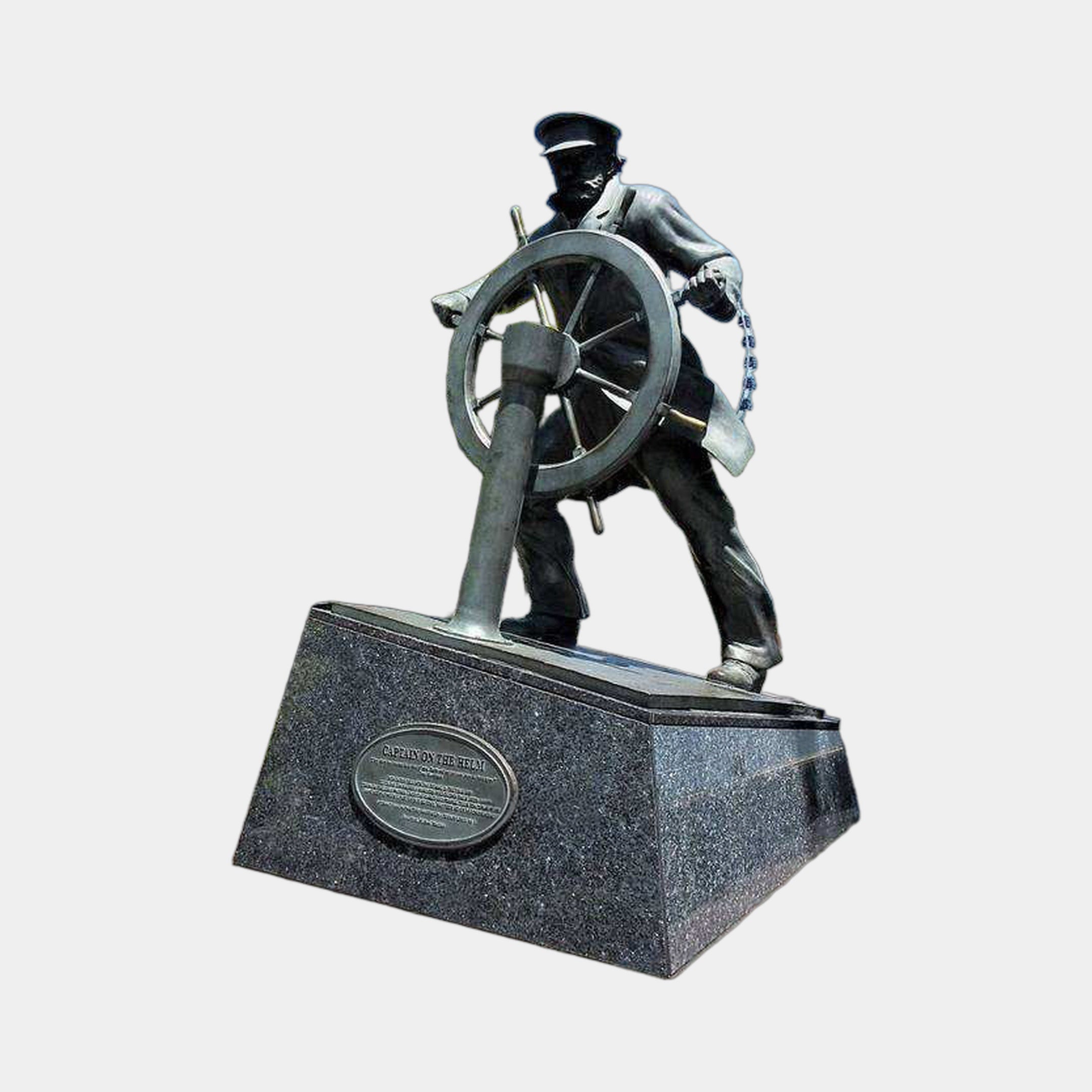 Monumental Traditional Sea Captain Bronze Sculpture by Giant Sculptures, dark patina figure gripping a ship's helm on an angled granite plinth with plaque.