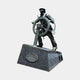 Monumental Traditional Sea Captain Bronze Sculpture by Giant Sculptures, dark patina figure gripping a ship's helm on an angled granite plinth with plaque.