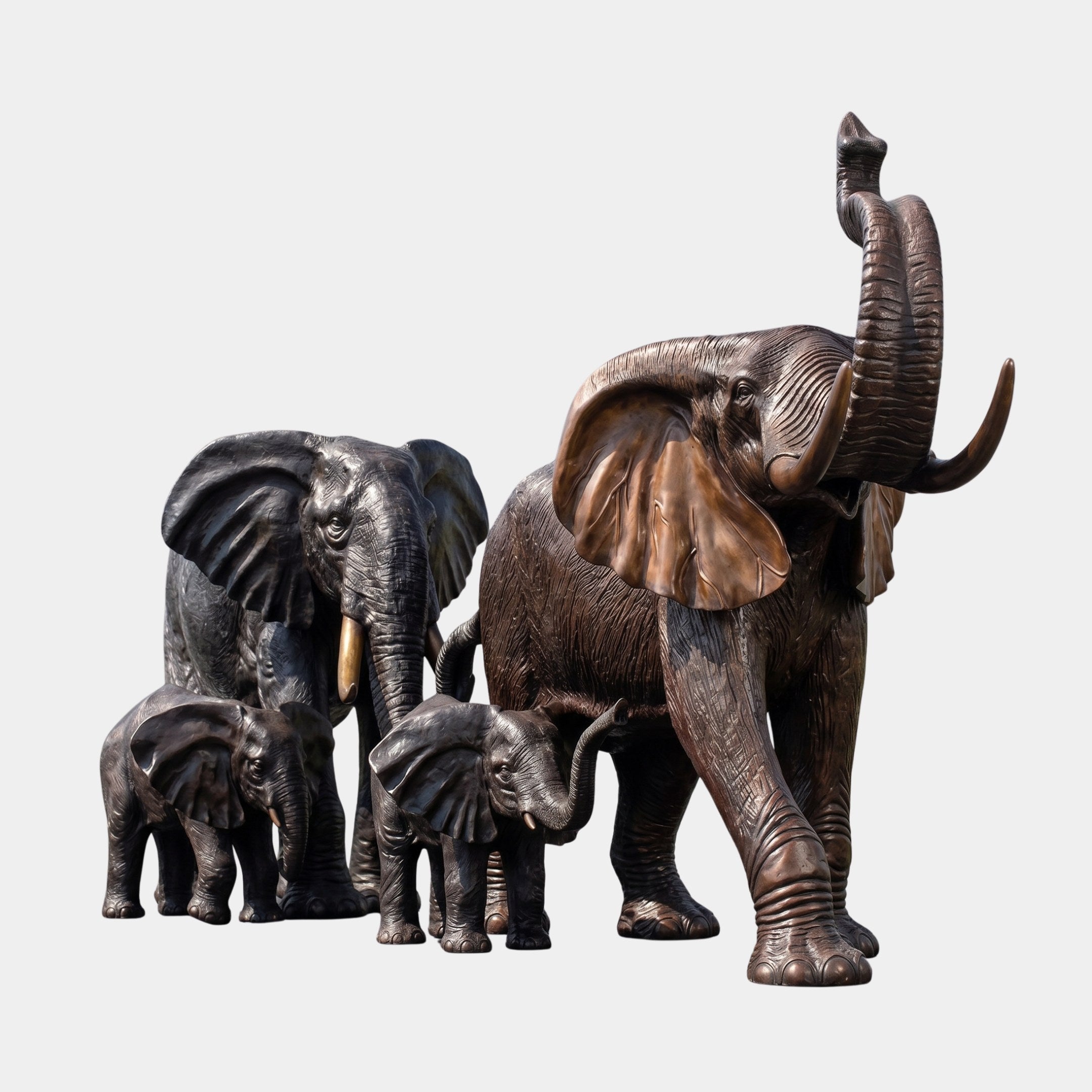 Monumental Trumpeting Elephant Herd Bronze Sculpture by Giant Sculptures, showing two adults with trunk raised and two calves in dark antique bronze patina.