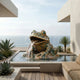 Traditional Bronze Frog Fountain Sculpture by Giant Sculptures with verdigris patina, water spouting from its mouth into a pool on an oceanfront terrace.
