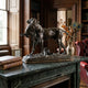 Giant Sculptures Traditional Hunting Dog with Hare Bronze Sculpture 40cm on a green marble mantel beside leather books and a brass carriage clock in a library.