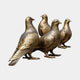Traditional Pigeon Group Bronze Sculpture by Giant Sculptures, four life-like pigeons in a staggered row with golden-brown patina, shown on a plain background.
